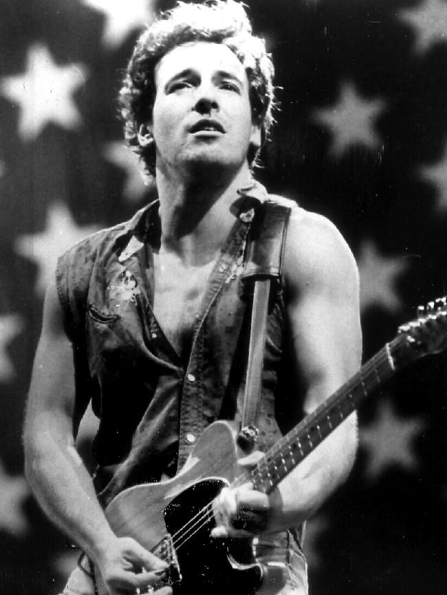 Springsteen plays Born in the USA during a 1995 concert. Picture: AP