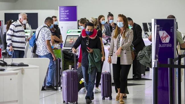 Passengers at Melbourne Airport on Friday. Picture: Aaron Francis/The Australian