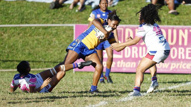 Lilly-Jay Licence breaks through a tackle in the Far North Queensland Rugby League (FNQRL) women's qualifying semi final match last year.