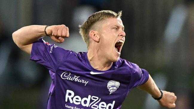 HOBART, AUSTRALIA - JANUARY 23: Nathan Ellis of the Hurricanes celebrates the wicket of Steve Smith of the Sixers during the Men's Big Bash League match between the Hobart Hurricanes and the Sydney Sixers at Blundstone Arena, on January 23, 2023, in Hobart, Australia. (Photo by Steve Bell/Getty Images)