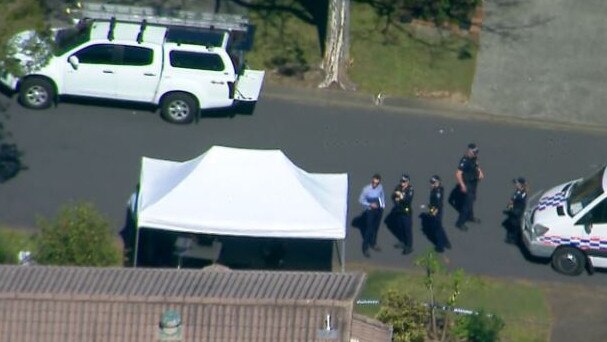 There is a heavy police presence in the Stretton street where a major crime scene has been established. Picture: 7 News