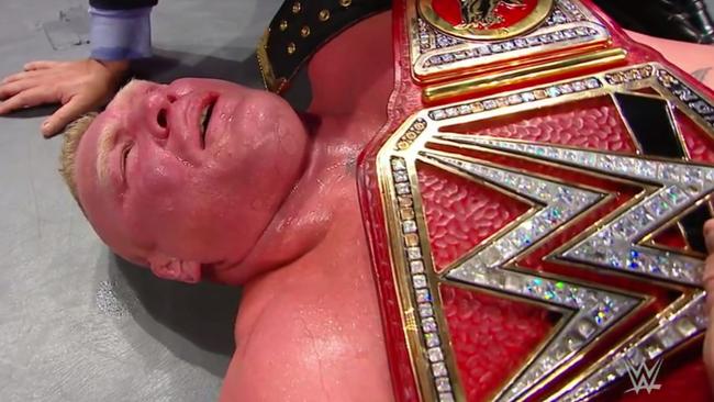 Brock Lesnar reacts after retaining the WWE Universal Championship.