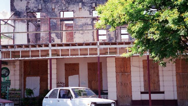 The burnt out remains of The Palace Backpackers Hostel at Childers in north Queensland, Australia. (AP Photo/Dennis Pasa)