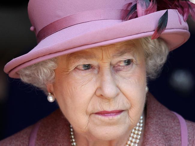 (FILE PIC)  Britain's Queen Elizabeth II is pictured during a visit to the Royal Foundation of St Katharine, in east London, on March 24, 2011. The Royal Foundation of St Katharine is one of the oldest religious foundations in Great Britain. It was founded in 1147 by Queen Matilda, as a hospital for the poor and patronage of The Foundation has been reserved unto the Queens of England ever since. AFP PHOTO/Adrian Dennis/WPA POOL/AFP (Photo by Adrian DENNIS / POOL / AFP)