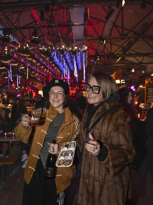 Sally Taylor and Elizaveta Maltseva at Winter Feast, part of Dark Mofo at Hobart Waterfront. Picture: Caroline Tan
