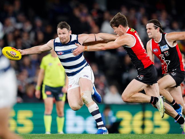 Patrick Dangerfield attempts to break away from Paddy Dow. Picture: Dylan Burns/AFL Photos