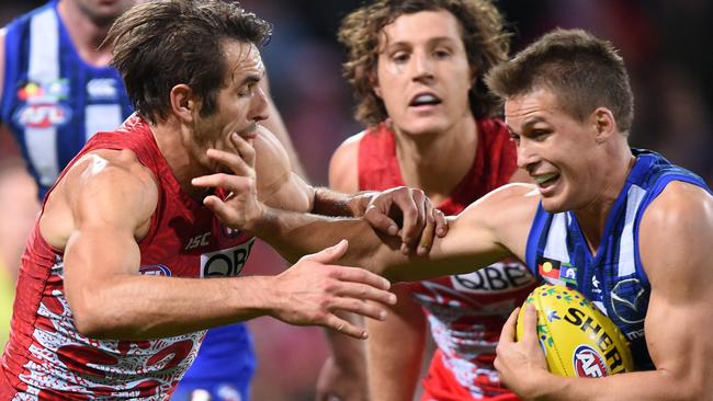 Josh Kennedy gets in Andrew Swallow’s face.