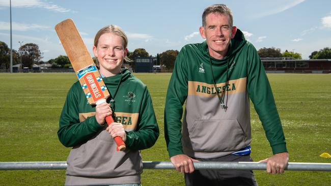 Annie Taylor with her father Jarrod in their Anglesea Cricket Club colours. Picture: Brad Fleet