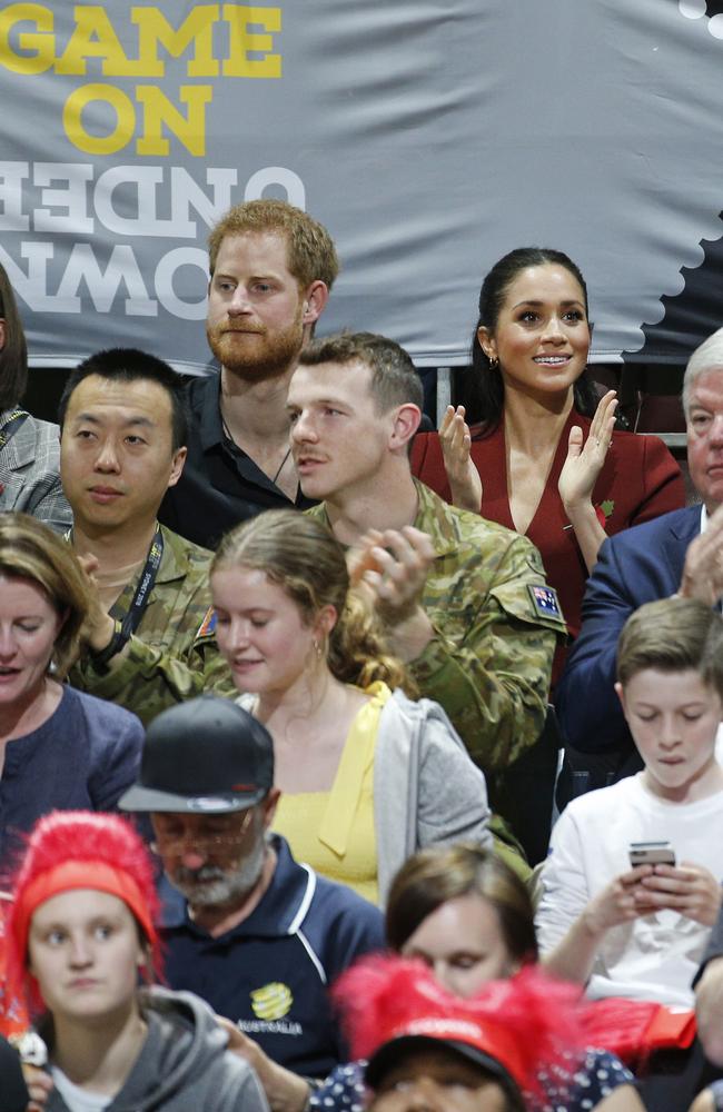 Prince Harry and Meghan pictured at the Invictus Games Wheelchair Basketball gold medal game at the Quaycentre arena at Sydney Olympic Park in Homebush, Sydney. Picture: Richard Dobson