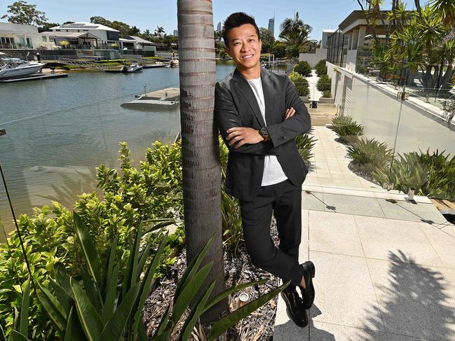 16/10/2020 : Ray White agent Sam Guo at property he is selling for over $4 million in Sorrento, on the Gold Coast. Foreign investment in residential property falling $1bn between the 2018 and 2019 fiscal years  but he is still selling to foreign buyers via WeChat .  Pic Lyndon Mechielsen