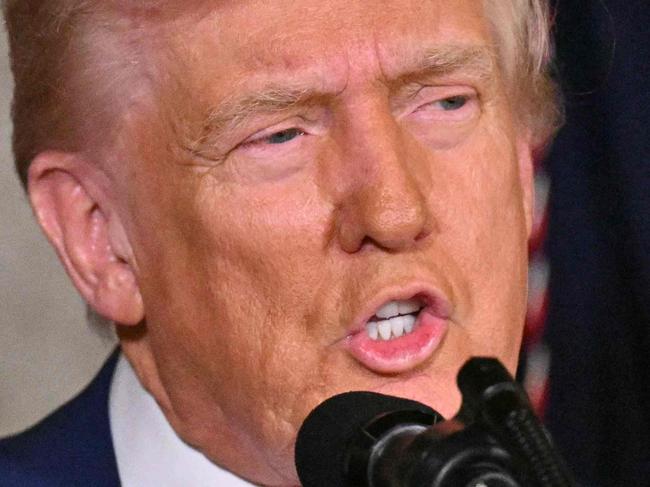 US President Donald Trump takes a question as he speaks during the signing of executive orders at his Mar-a-Lago resort in Palm Beach, Florida, on February 18, 2025. Trump signed an executive order February 18 aimed at improving the affordability and availability of in vitro fertilization, a health issue he had addressed on the campaign trail. (Photo by ROBERTO SCHMIDT / AFP)