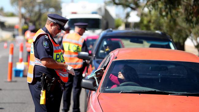 Police are targeting those on their phones while driving all across the country. Picture: Simon Cross