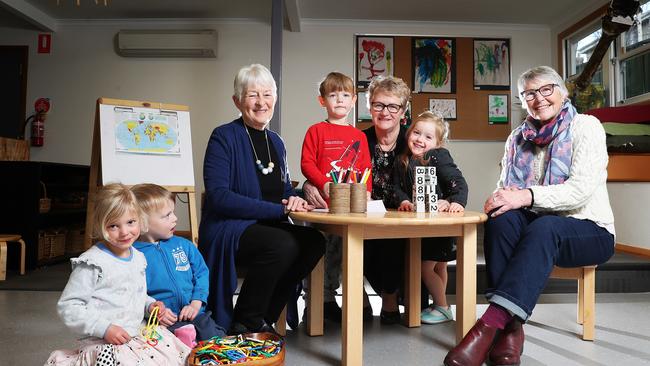 Twins Imogen and Xavier Nahodil 4, left, Helen Stephen who was a kinder teacher for 25 years at the Battery Point service, Thomas Lovell 4, Ros Cornish CEO Lady Gowrie Tasmania, Lilli Saward 3, and Elsa Schwan who was administration manager for 22 years at Battery Point. Picture: NIKKI DAVIS-JONES