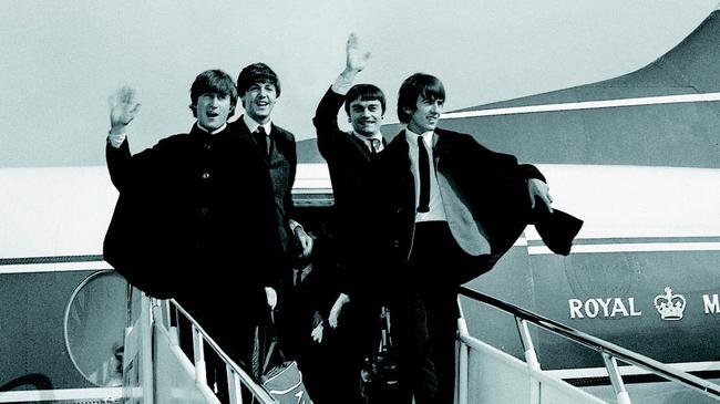 The Beatles – George Harrison, Paul McCartney John Lennon and stand-in drummer Jimmie Nicol – arrive in Adelaide. Picture: Supplied