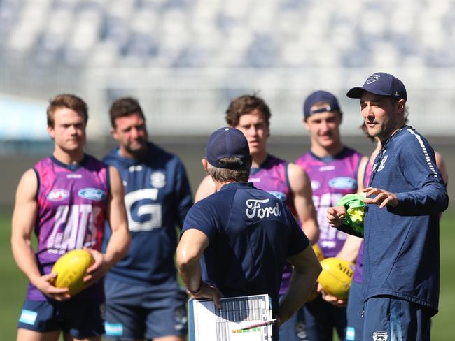 Coach Shaun Grigg with players Geelong Cats training at GMHBA Stadium on Wednesday morning. Picture: Alan Barber