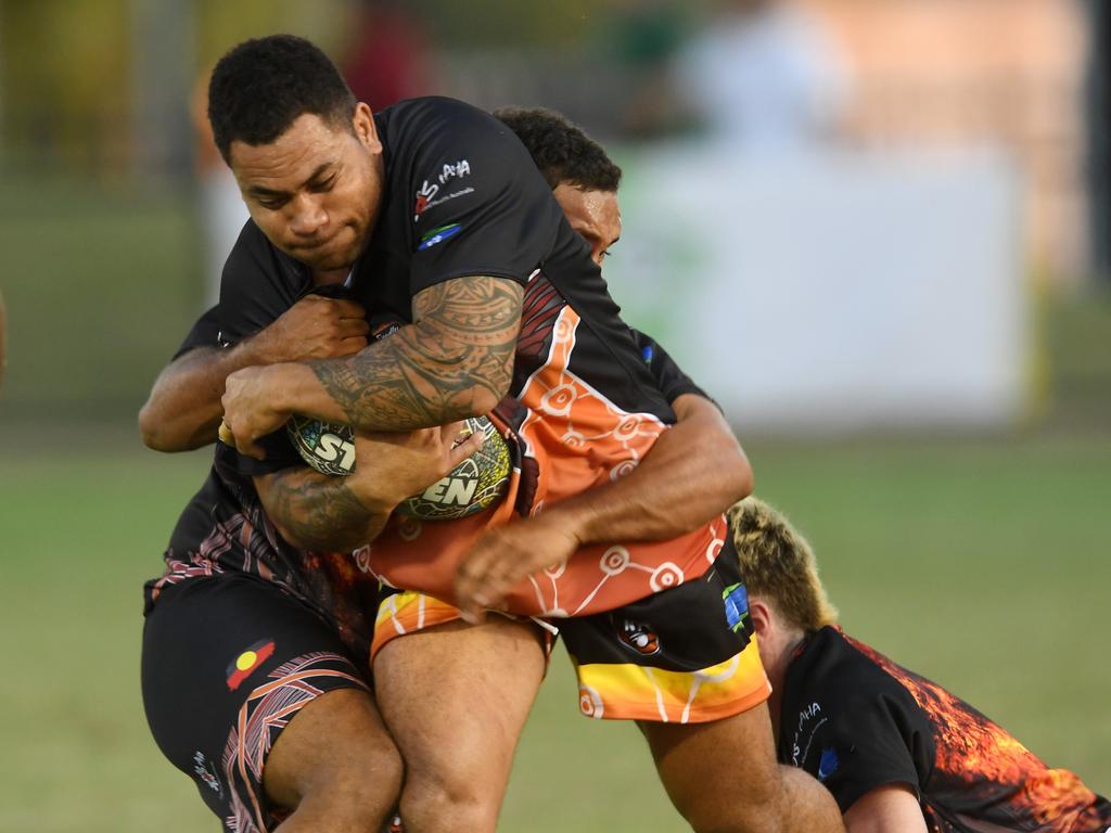 Standout Territory captain Simaika Salaa charges into the Indigenous All Stars’ defence on Sunday. Pictures: (A)manda Parkinson