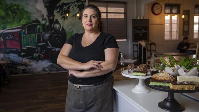 An angry Melissa Surace, manager of the Sticks and Stones cafe on the main street of Emerald, a ‘hot spot’ with no cases. Picture: Wayne Taylor