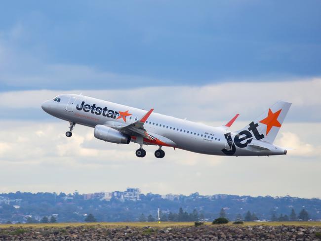 SYDNEY, AUSTRALIA - NewsWire Photos JUNE 14, 2021: A view of a Jetstar plane taking off at Sydney Domestic Airport from Port Botany in Sydney Australia. Picture: NCA NewsWire / Gaye Gerard