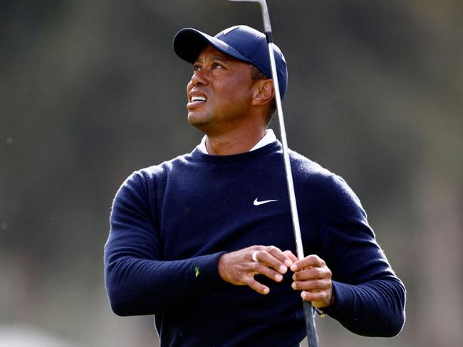 PACIFIC PALISADES, CALIFORNIA - FEBRUARY 16: Tiger Woods of the United States follows his shot on the 12th hole during the first round of the The Genesis Invitational at Riviera Country Club on February 16, 2023 in Pacific Palisades, California.   Ronald Martinez/Getty Images/AFP (Photo by RONALD MARTINEZ / GETTY IMAGES NORTH AMERICA / Getty Images via AFP)