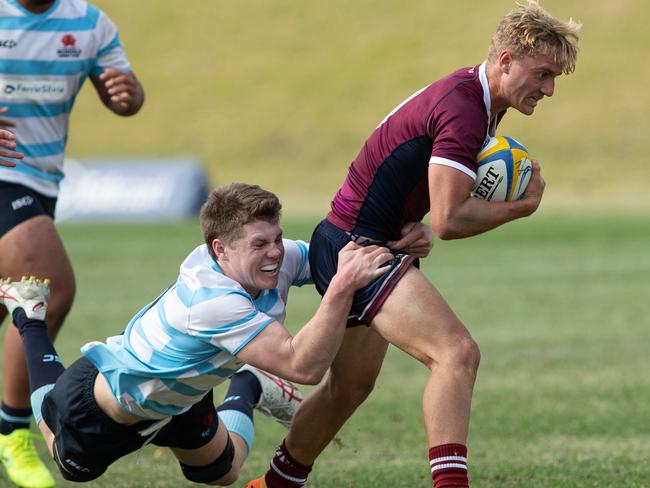 03/07/23. News Local. Sport.Merrylands, Sydney, NSW, Australia.2023 Australian Schools Rugby Championship at Eric Tweedale Stadium, MerrylandsAction from the boys NSW 2 v Queensland 1 gameNSW Johannes Logan tackles QueenslandÃs Tyler Stevens.Picture: Julian Andrews