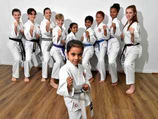 READY TO FIGHT: Sunshine Coast Karate members (back, from left) Klaudia Caston, Sami Phillips, Rosemarie Caston, Patrick Edwards, Raiyan Khan, Na'ila Khan, Miguel Hardy, Faith Hardy, Renae Saunders and (front) Mahirah Khan, 5 are travelling to Canada for the world championships. Picture: Warren Lynam