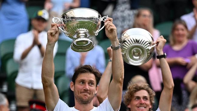 Ebden and Purcell with their trophies. Picture: AFP