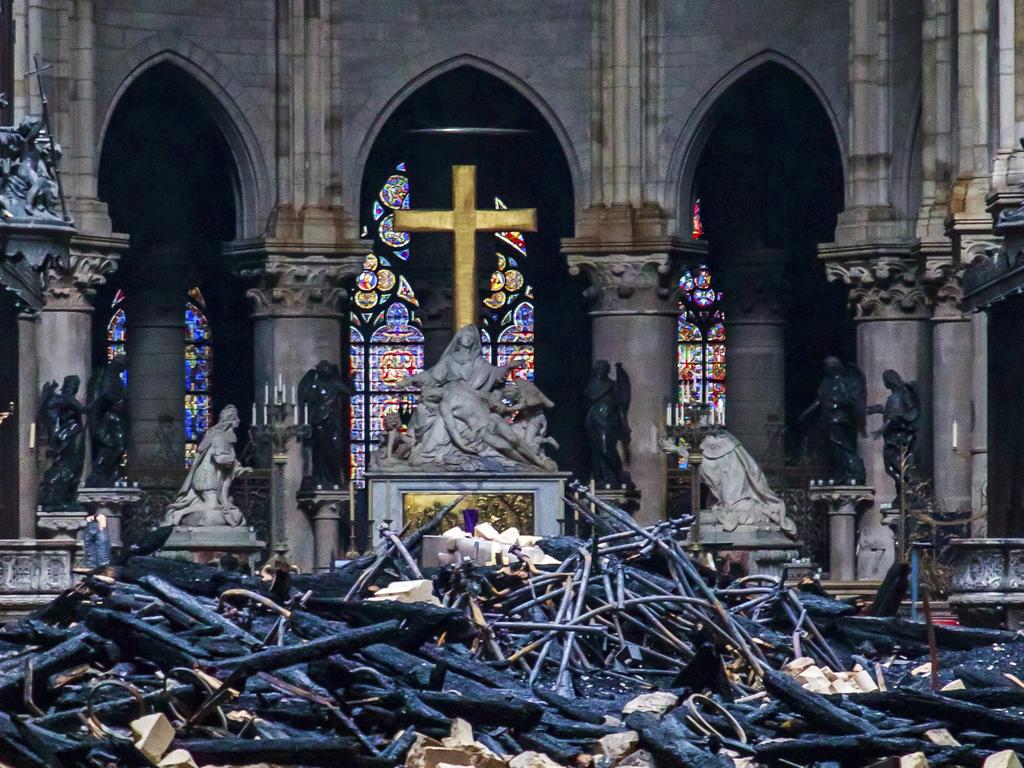 Debris inside Notre Dame cathedral. Picture: Christophe Petit Tesson/AP