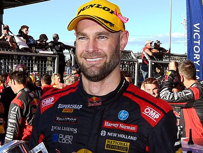 BATHURST, AUSTRALIA - OCTOBER 08: Shane van Gisbergen holds the Peter Brock trophy after driving the Triple Eight Race Engineering Chevrolet Camaro to victory during the Bathurst 1000, part of the 2023 Supercars Championship Series at Mount Panorama on October 08, 2023 in Bathurst, Australia. (Photo by Morgan Hancock/Getty Images)