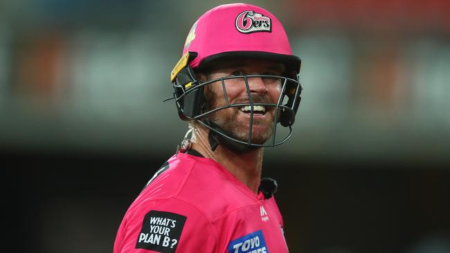 Dan Christian celebrates the Sydney Sixers’ thrilling win at Metricon Stadium.