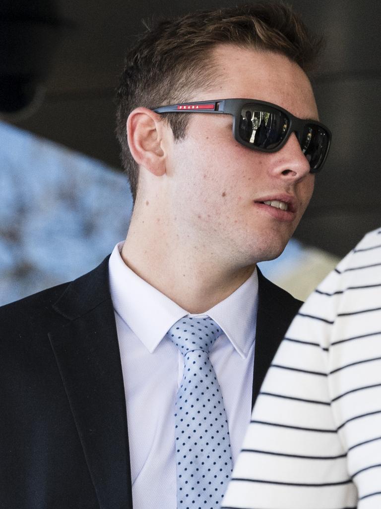 Kyle James Hibbins chats with friends as he leaves Toowoomba Courthouse after being sentenced for armed robbery, Friday, September 1, 2023.