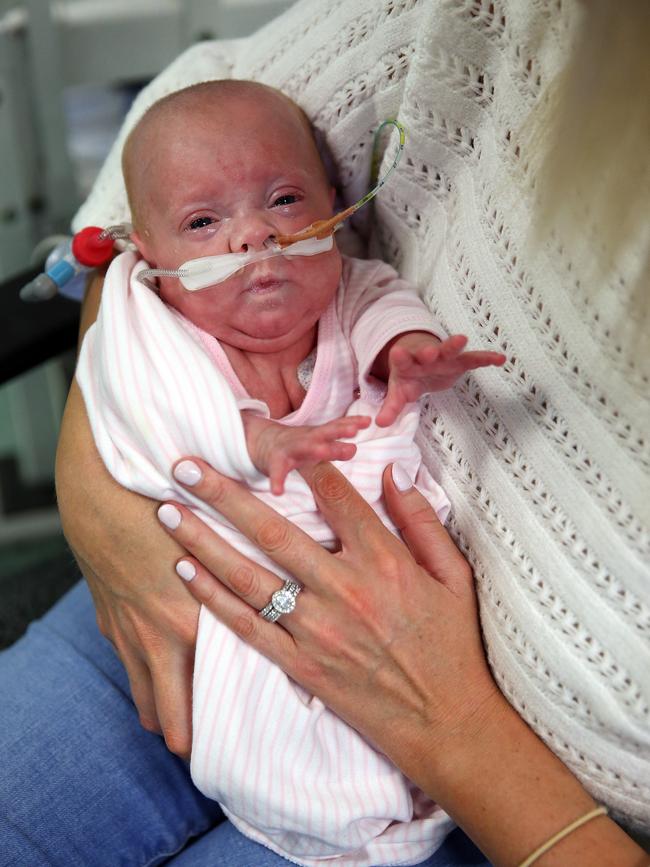 Ms Austin was allowed her first precious cuddle with Skylah when Skylah was four-weeks-old. Picture: Sam Ruttyn