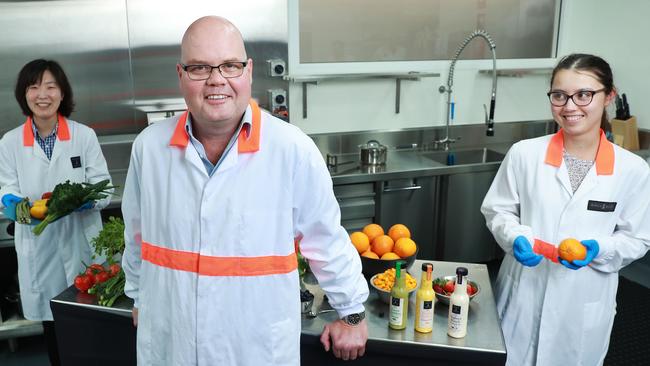 CEO Paul O’Brien with staff at Birch &amp; Waite in Sydney. Picture: John Feder