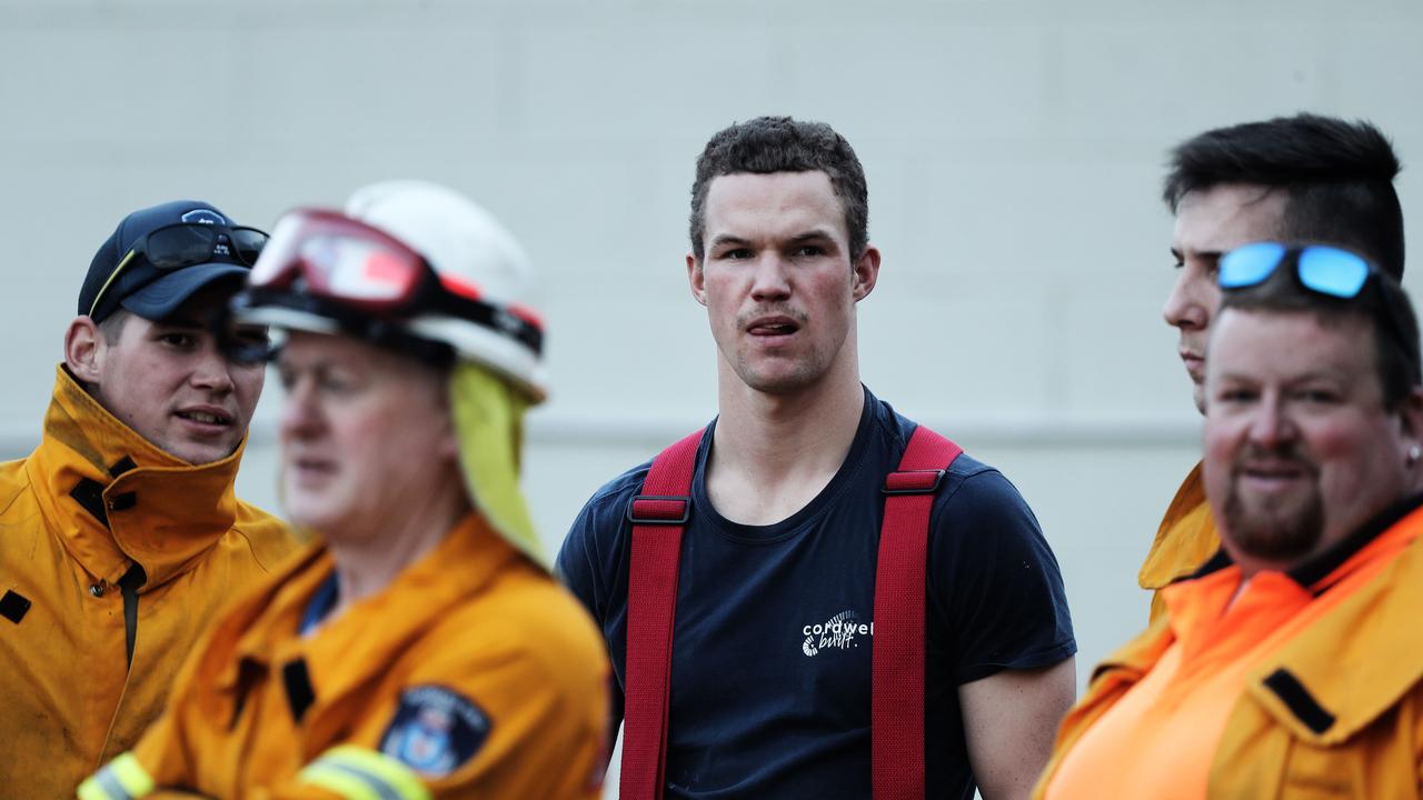 Lachlan Fire: Tasmania Fire Service personnel, including Tom Broadby (centre) at Lachlan Fire Station. Picture: LUKE BOWDEN