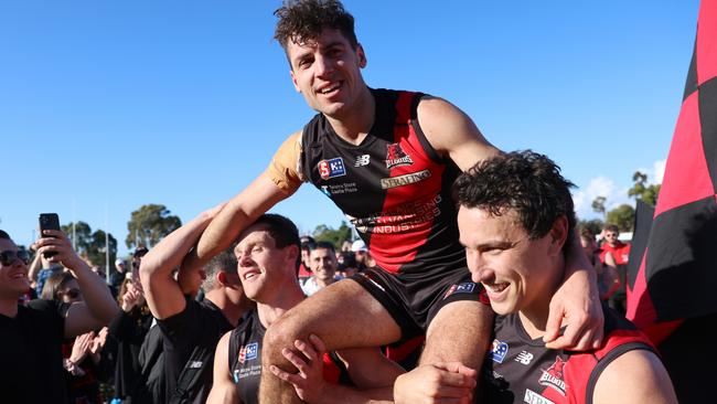 Retiring West Adelaide star Logan Hill is chaired from the field in his final SANFL game against Norwood on Saturday. Picture: Cory Sutton/SANFL.