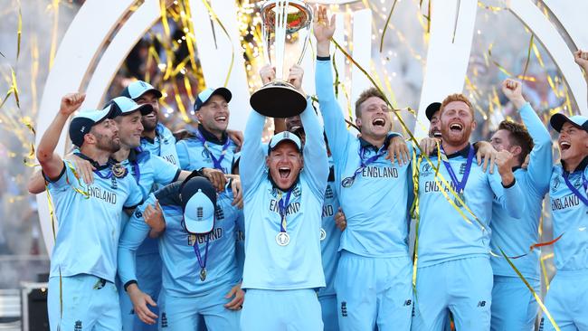 LONDON, ENGLAND - JULY 14: England Captain Eoin Morgan lifts the World Cup with the England team after victory for England during the Final of the ICC Cricket World Cup 2019 between New Zealand and England at Lord's Cricket Ground on July 14, 2019 in London, England. (Photo by Michael Steele/Getty Images)