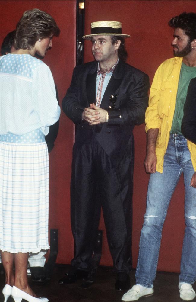 Princess Diana meets singers Elton John (centre) and George Michael at Wembley Stadium in London for the Live Aid famine relief concert in 1985. Picture: AP Photo, File