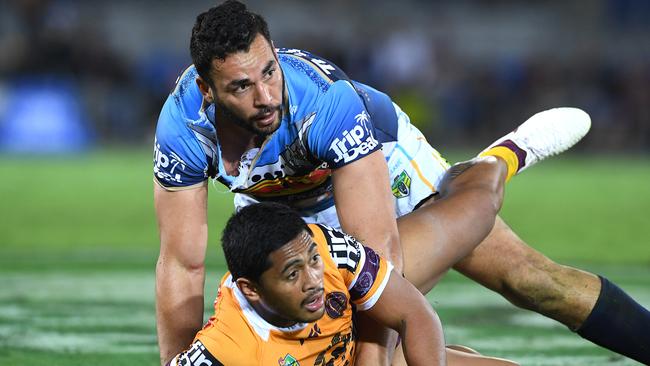 Ryan James of the Titans and Anthony Milford of the Broncos look on during the Round 17 NRL match between the Gold Coast Titans and the Brisbane Broncos at Cbus Super Stadium in Robina on the Gold Coast. Sunday, July 8, 2018. (AAP Image/Dave Hunt) NO ARCHIVING, EDITORIAL USE ONLY