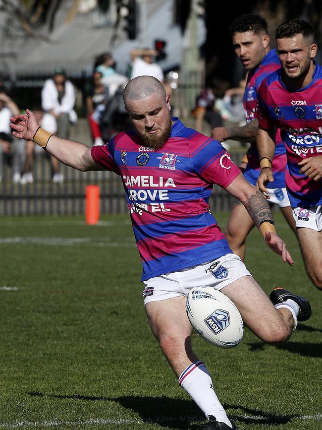 Alexandria Rovers' Jake Trindall kicks the ball. Picture: John Appleyard