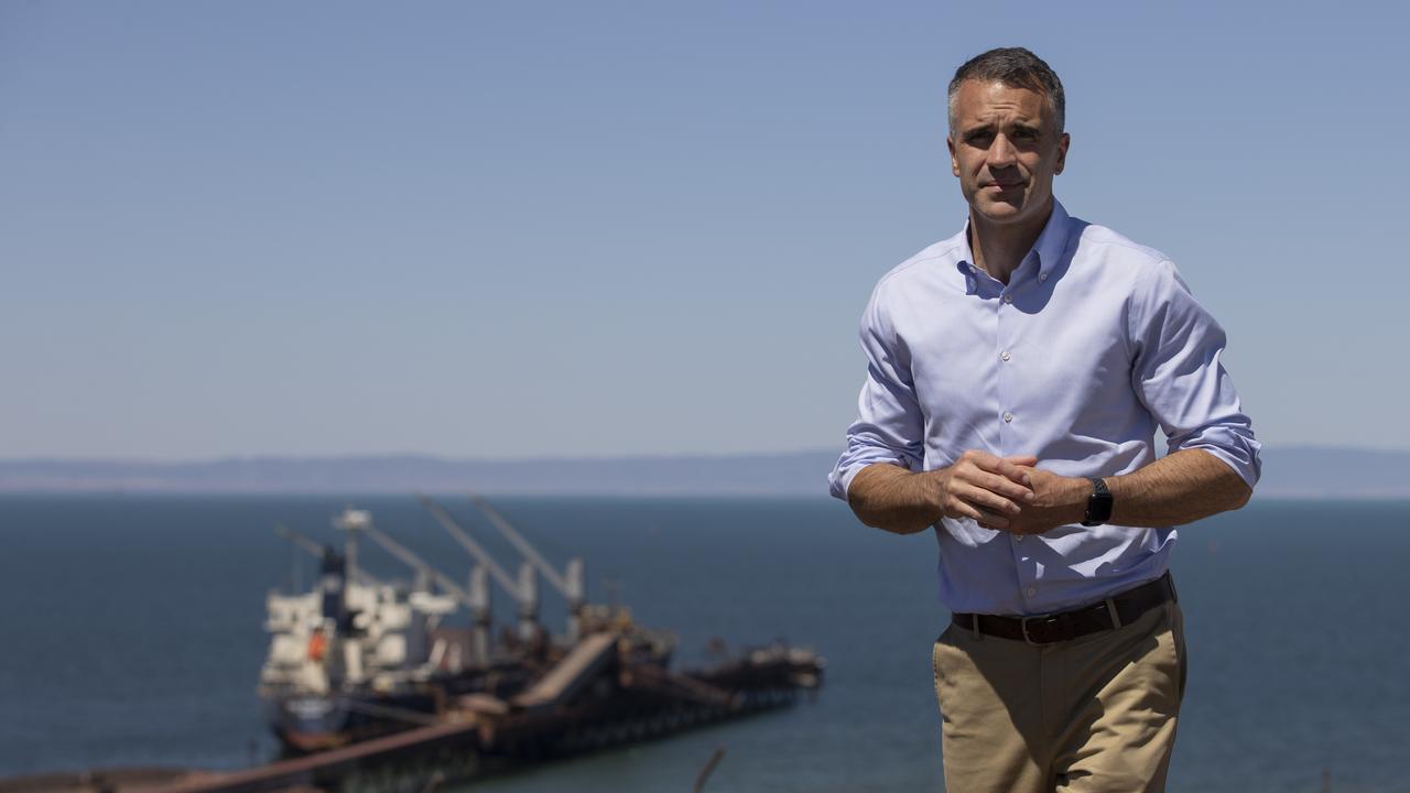 Premier Peter Malinauskas stands on Hummock Hill Lookout in Whyalla, overlooking a ship at No. 2 Ore Jetty at Whyalla Steelworks in February. Picture: Brett Hartwig