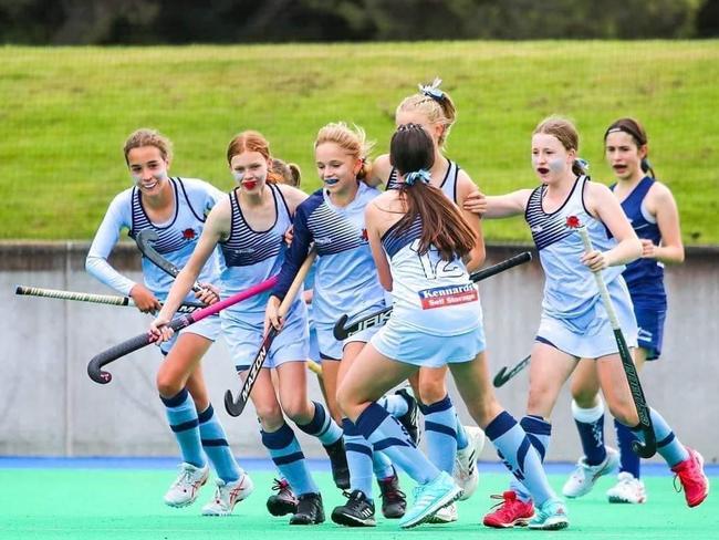 Meg Amos celebrates a goal at the 2022 Hockey Australia U13 championships in Hobart.