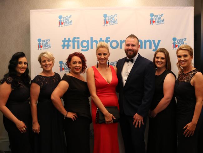 Rebecca and Ross O’Donovan with committee members of the Fight For Finn Foundation at the black tie fundraiser: Carla Condoluci, Louise Weir, Belinda Basha, Melanie Burnicle and Natalie Summerland.