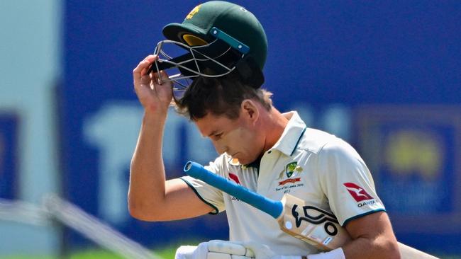 Australia's Marnus Labuschagne walks back to the pavilion after his dismissal during the second day of second test cricket match between Australia and Sri Lanka at the Galle International Cricket Stadium in Galle on February 7, 2025. (Photo by Ishara S. KODIKARA / AFP)