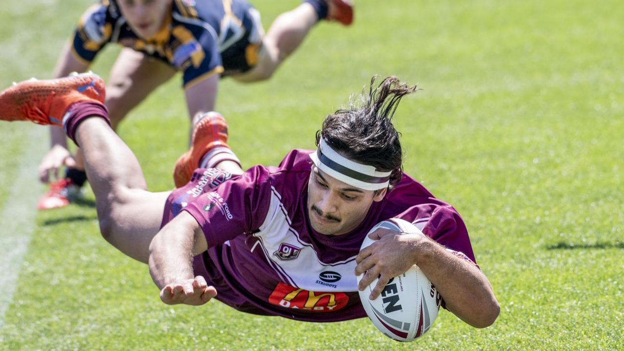 Highfields half back Ryan Gill can only watch Dalby's Keanu Wright-Dunrobin score the last try. Dalby vs Highfields. 2021 TRL Under 18s final. Sunday, September 19, 2021. Picture: Nev Madsen.