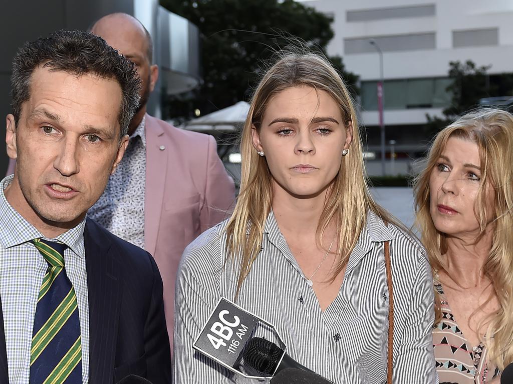 Australian swimmer Shayna Jack and her lawyer front the media on Friday.