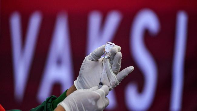 A health worker prepares a dose of the Sinovac vaccine against the Covid-19 coronavirus during a mass vaccination in Sibreh, at Indonesia’s Aceh province. Picture: AFP