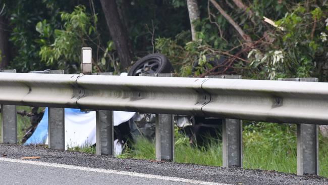 Two people are feared dead after a serious single-vehicle rollover on the Bruce Highway north of Ingham. North Queensland police received reports of a vehicle located upside down after a single-vehicle crash on the Bruce Highway in Damper Creek, located about 1 km north of Conn Creek bridge, about 6.14am on Tuesday. Picture: Cameron Bates