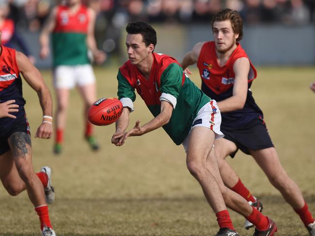 Peninsula FNL: Mt Eliza v Pines at Emil Madsen Reserve, Mt Eliza. Pines #23 Jack Fisher sends out a handball. Picture: Chris Eastman