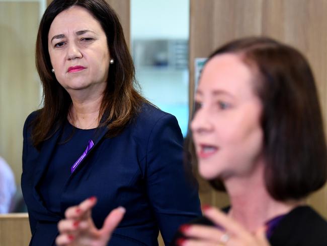 BRISBANE, AUSTRALIA - NewsWire Photos - MARCH 08, 2021. Queensland Premier Annastacia Palaszczuk watches Health Minister Yvette D'Ath as she speaks during a visit to the Surgical, Treatment and Rehabilitation Service (STARS) facility. Picture: NCA NewsWire / Dan Peled