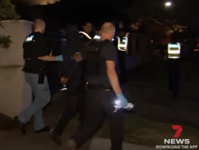 Police arrest make several arrests in Kew. Picture: 7 News