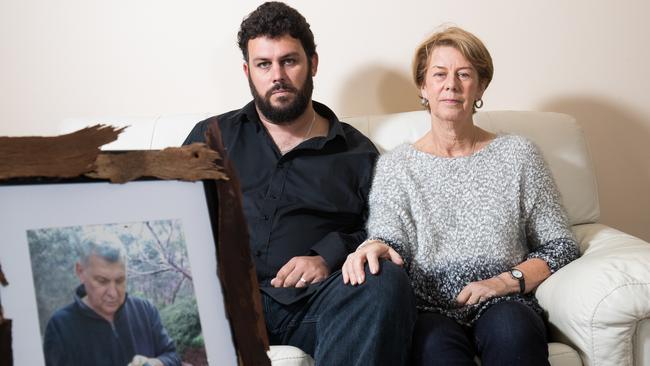 Clive and Barb Spriggs with a photo of father and husband Bob Spriggs who died after alleged mistreatment at Oakden. Picture: Matt Loxton